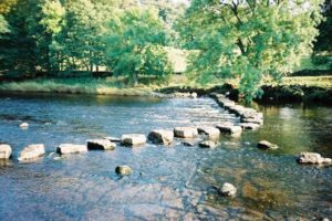 stepping stones across a river
