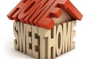 Word art picture of Home Sweet Home arranged in the shape of a house.