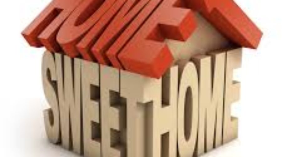 Word art picture of Home Sweet Home arranged in the shape of a house.