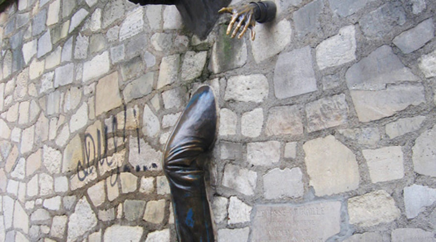 A man coming through a wall or stuck in a wall as a metaphor from Enneagram Type 5's