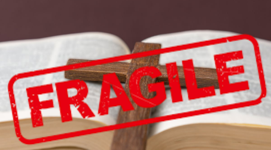 PIcture of a Bible with a Fragile sticker on it